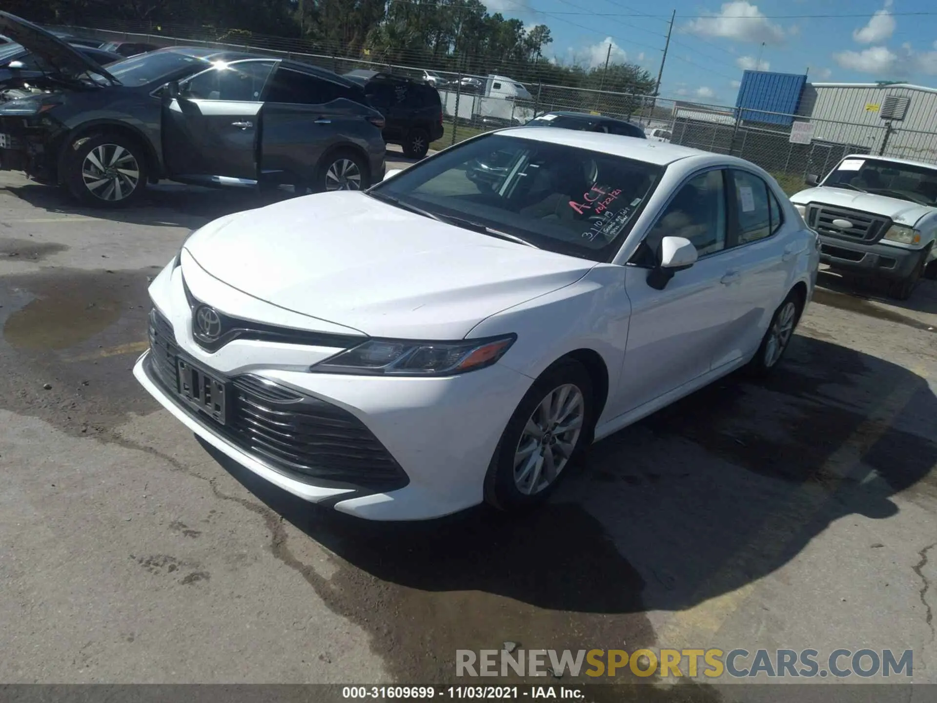 2 Photograph of a damaged car 4T1B11HK4KU239284 TOYOTA CAMRY 2019