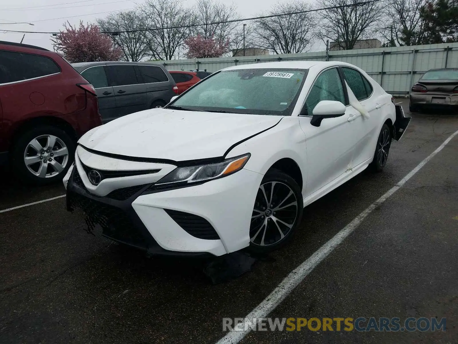 2 Photograph of a damaged car 4T1B11HK4KU689758 TOYOTA CAMRY 2019