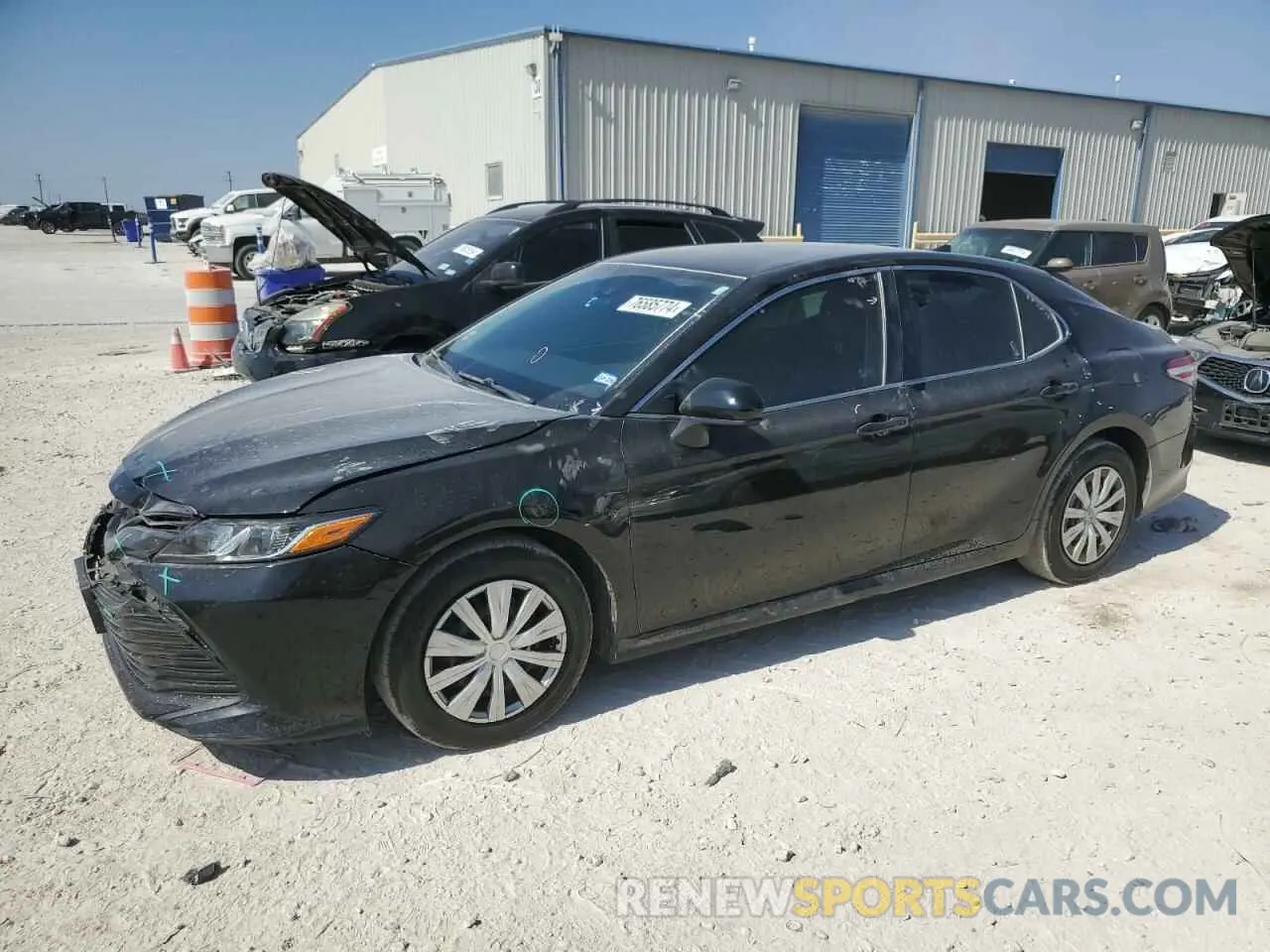 1 Photograph of a damaged car 4T1B11HK4KU723374 TOYOTA CAMRY 2019