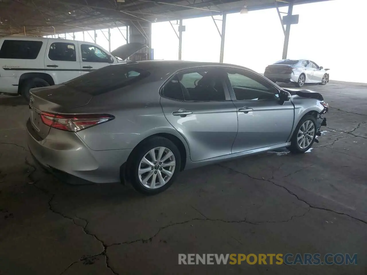 3 Photograph of a damaged car 4T1B11HK4KU723813 TOYOTA CAMRY 2019