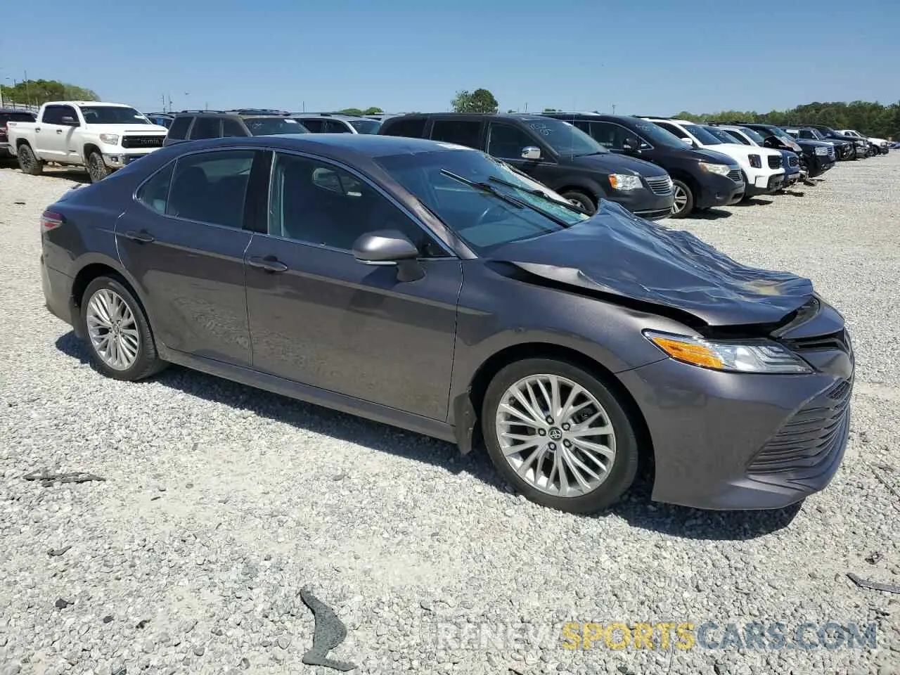 4 Photograph of a damaged car 4T1B11HK4KU725979 TOYOTA CAMRY 2019
