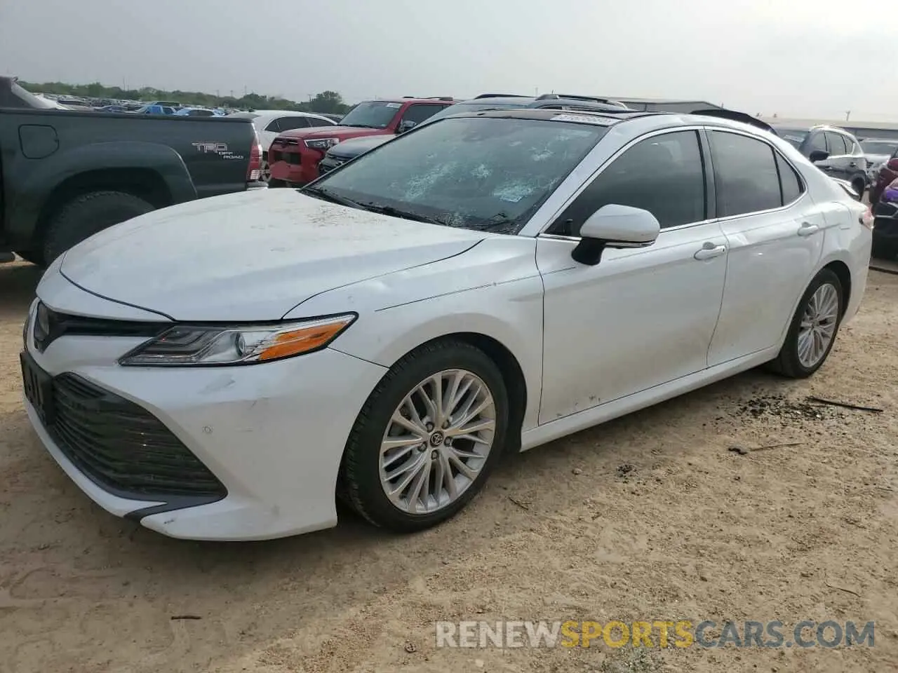 1 Photograph of a damaged car 4T1B11HK4KU745357 TOYOTA CAMRY 2019