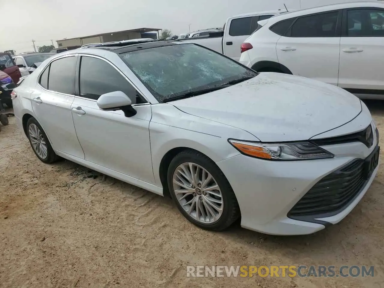 4 Photograph of a damaged car 4T1B11HK4KU745357 TOYOTA CAMRY 2019
