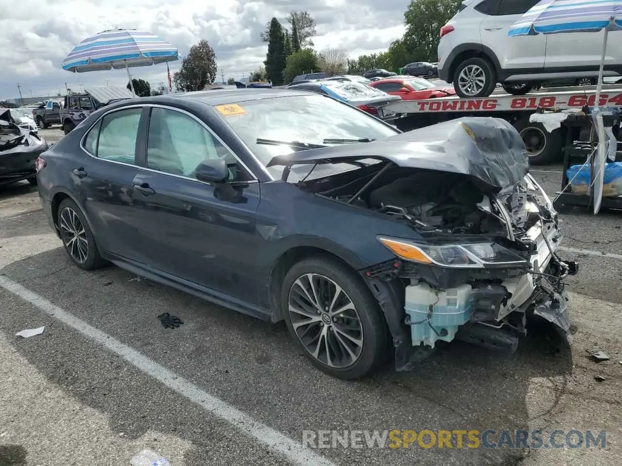 4 Photograph of a damaged car 4T1B11HK4KU751062 TOYOTA CAMRY 2019