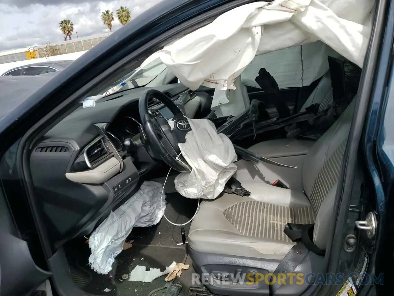 7 Photograph of a damaged car 4T1B11HK4KU751062 TOYOTA CAMRY 2019