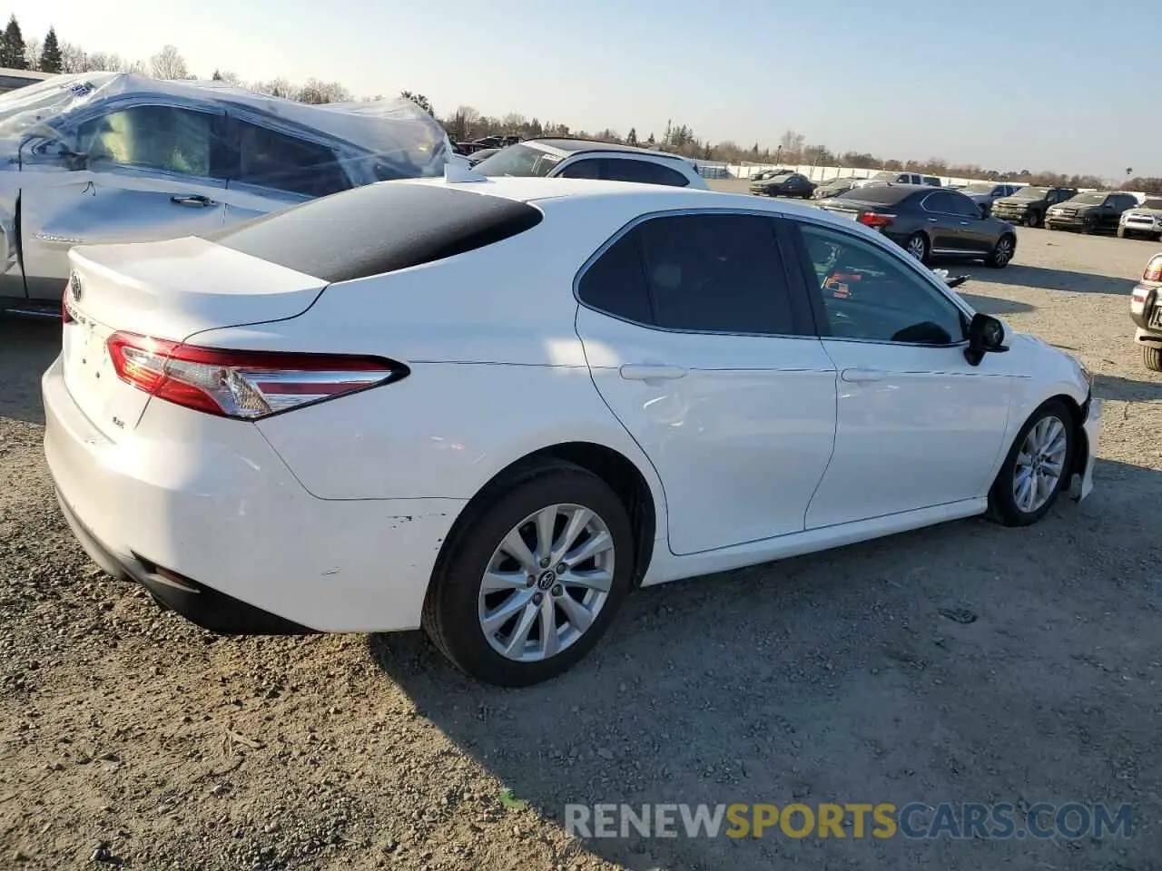 3 Photograph of a damaged car 4T1B11HK4KU751613 TOYOTA CAMRY 2019