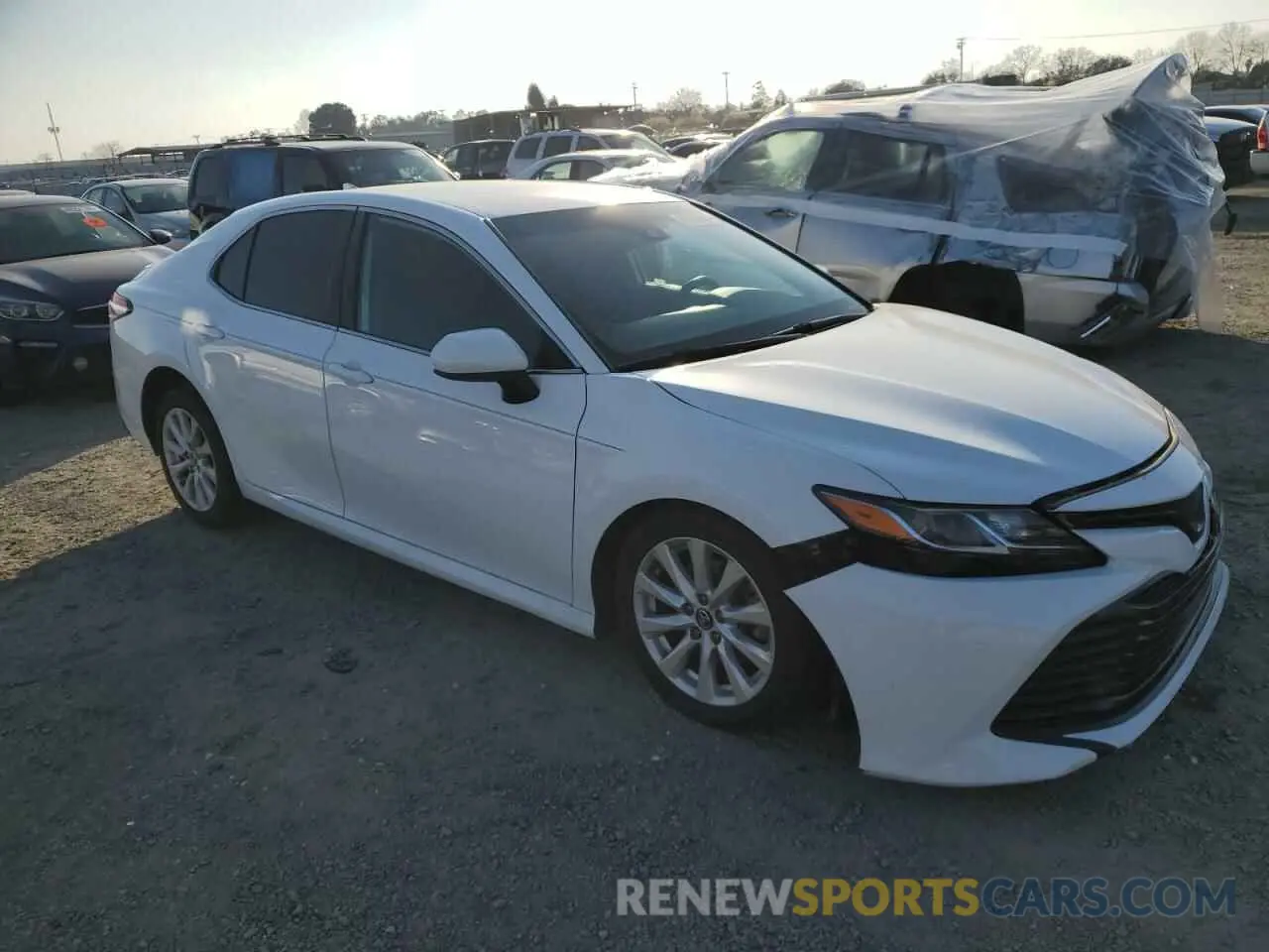 4 Photograph of a damaged car 4T1B11HK4KU751613 TOYOTA CAMRY 2019