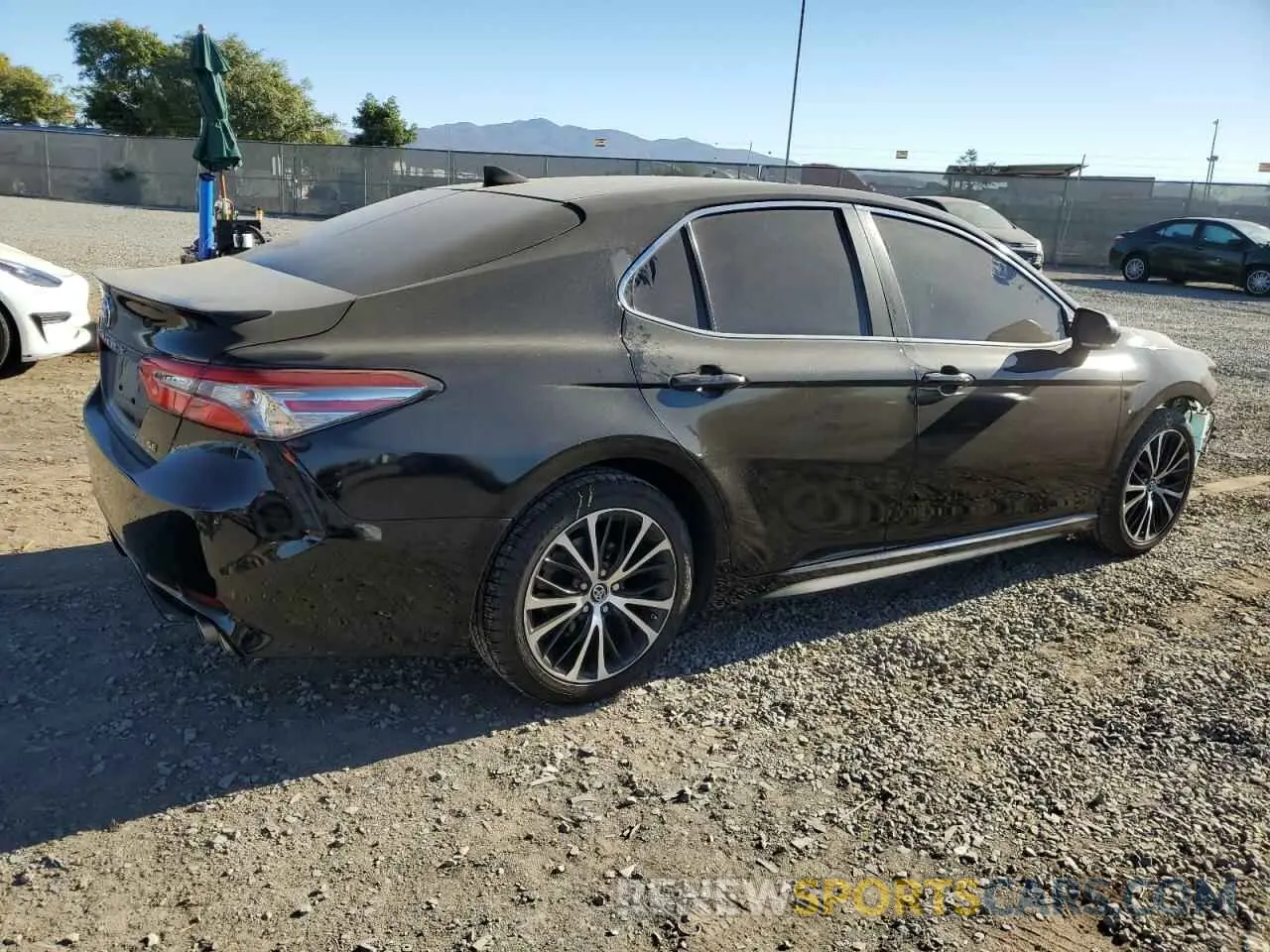 3 Photograph of a damaged car 4T1B11HK4KU772204 TOYOTA CAMRY 2019