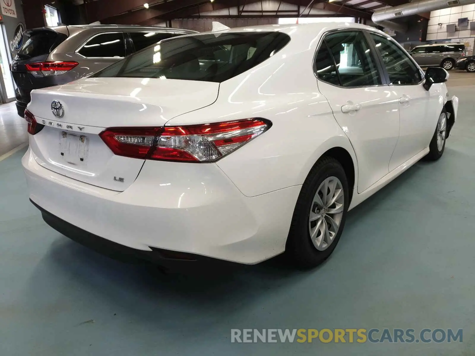 4 Photograph of a damaged car 4T1B11HK4KU775068 TOYOTA CAMRY 2019