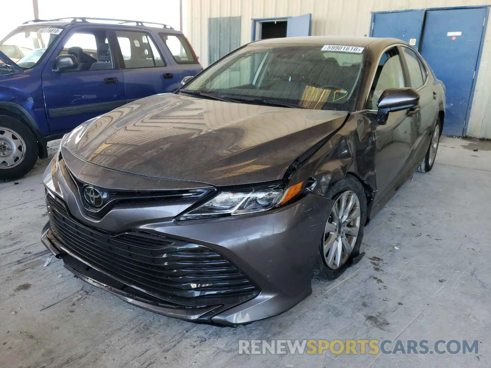 2 Photograph of a damaged car 4T1B11HK4KU812927 TOYOTA CAMRY 2019