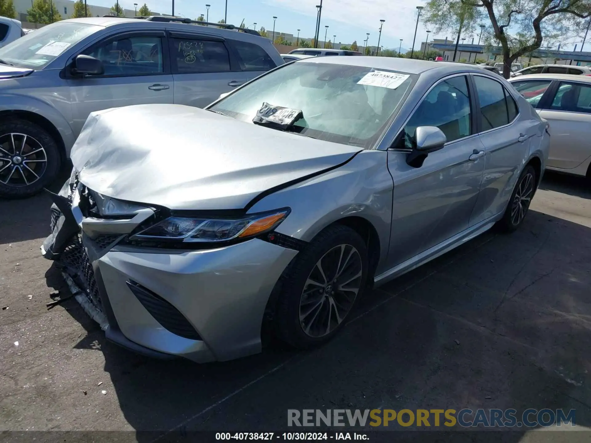 2 Photograph of a damaged car 4T1B11HK4KU841263 TOYOTA CAMRY 2019