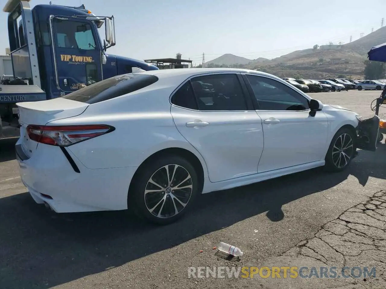 3 Photograph of a damaged car 4T1B11HK5KU186109 TOYOTA CAMRY 2019