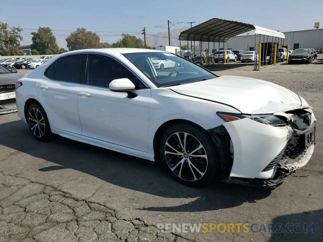 4 Photograph of a damaged car 4T1B11HK5KU186109 TOYOTA CAMRY 2019