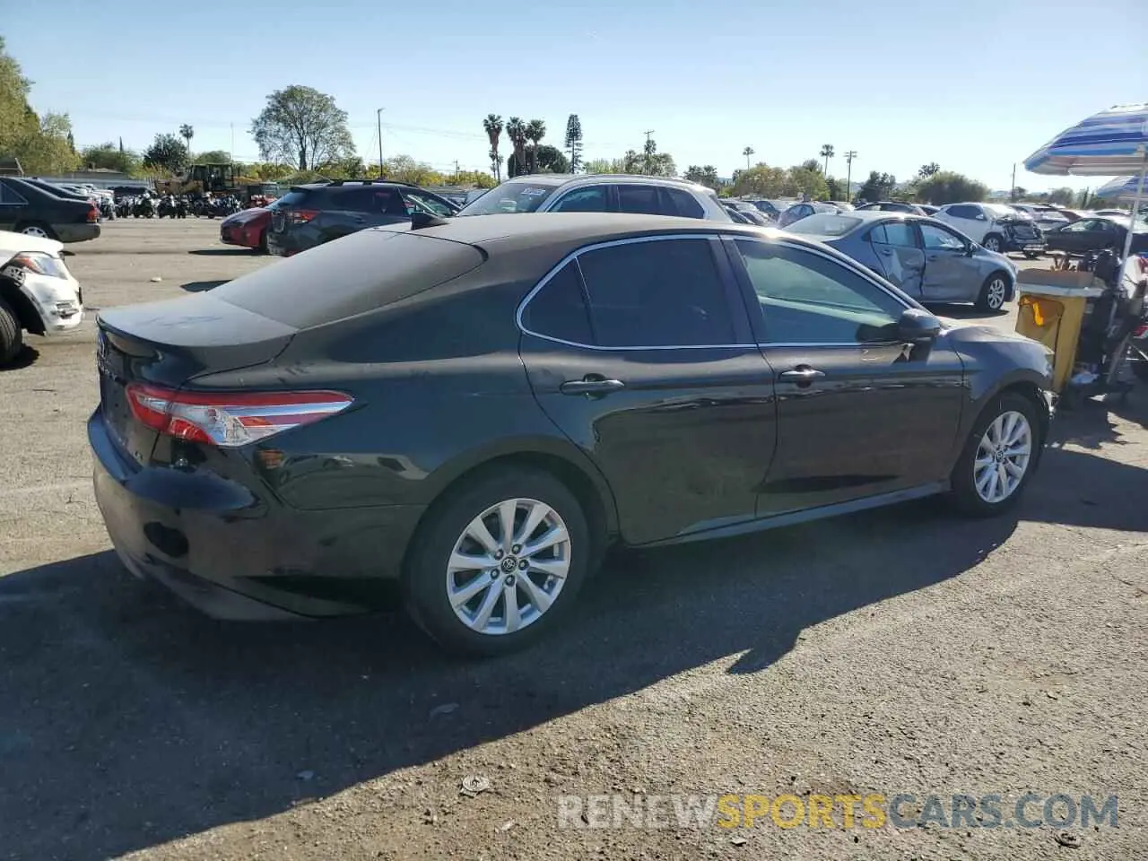 3 Photograph of a damaged car 4T1B11HK5KU204138 TOYOTA CAMRY 2019