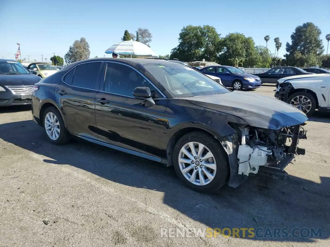 4 Photograph of a damaged car 4T1B11HK5KU204138 TOYOTA CAMRY 2019