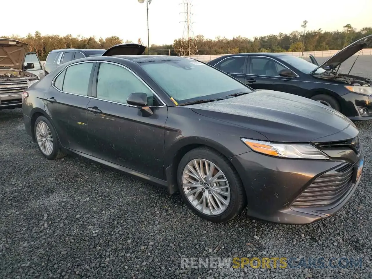 4 Photograph of a damaged car 4T1B11HK5KU296299 TOYOTA CAMRY 2019