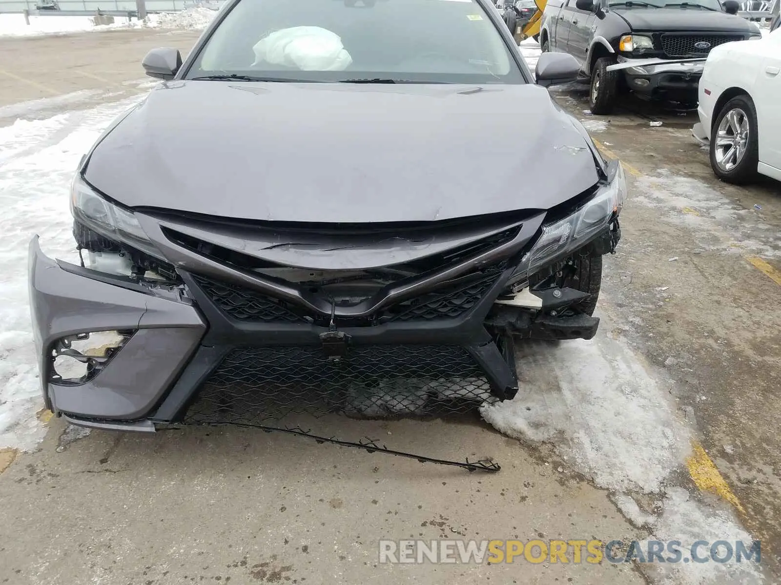 9 Photograph of a damaged car 4T1B11HK5KU776973 TOYOTA CAMRY 2019