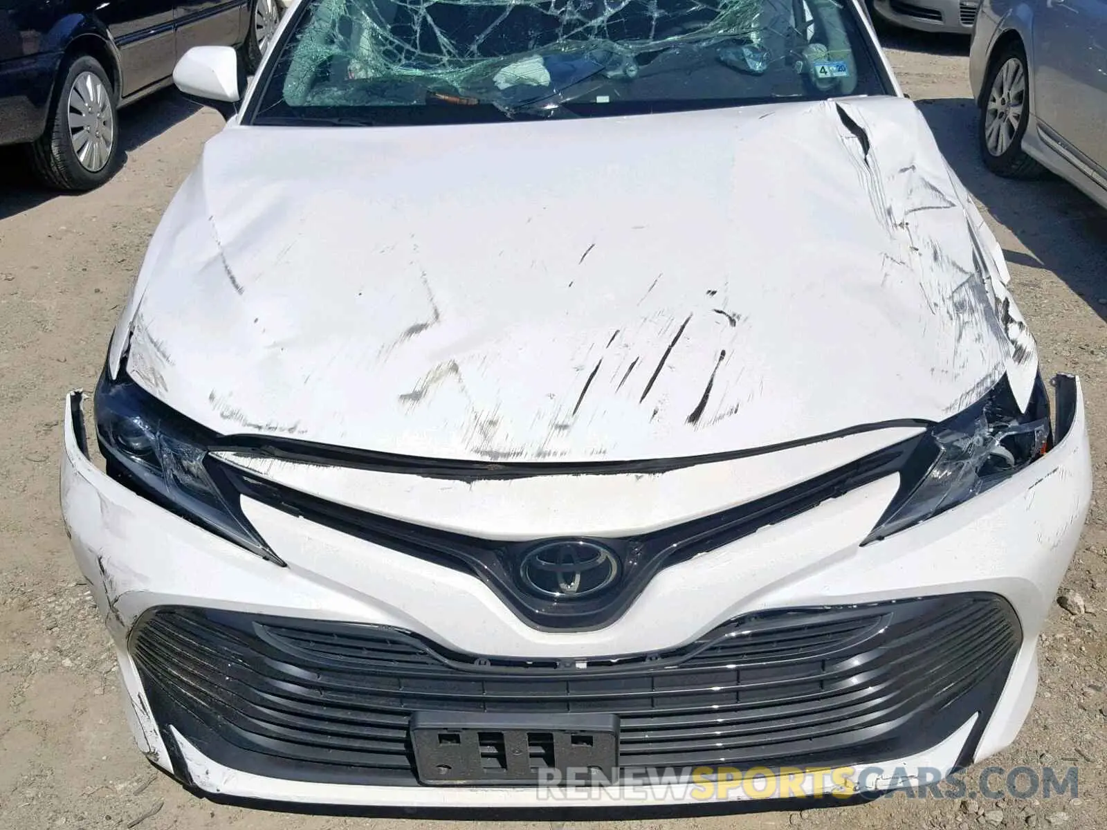 7 Photograph of a damaged car 4T1B11HK6KU169531 TOYOTA CAMRY 2019