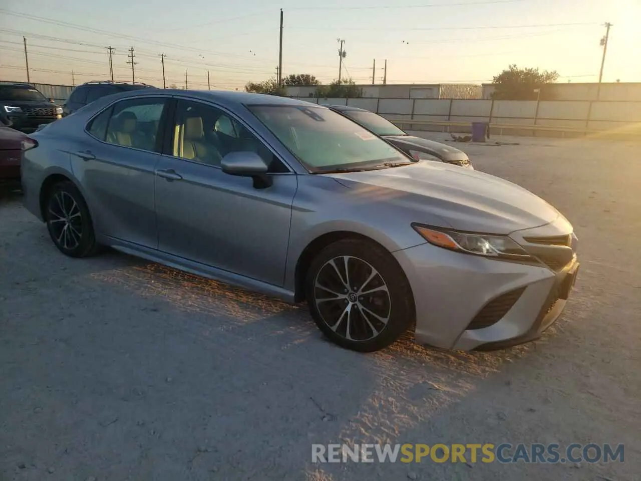 4 Photograph of a damaged car 4T1B11HK6KU204049 TOYOTA CAMRY 2019