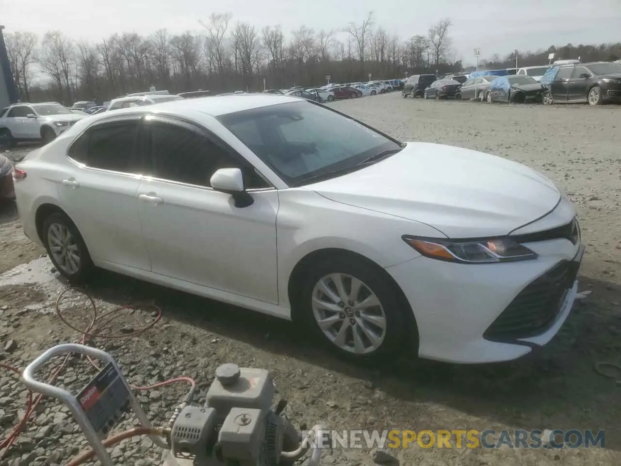 4 Photograph of a damaged car 4T1B11HK6KU207081 TOYOTA CAMRY 2019