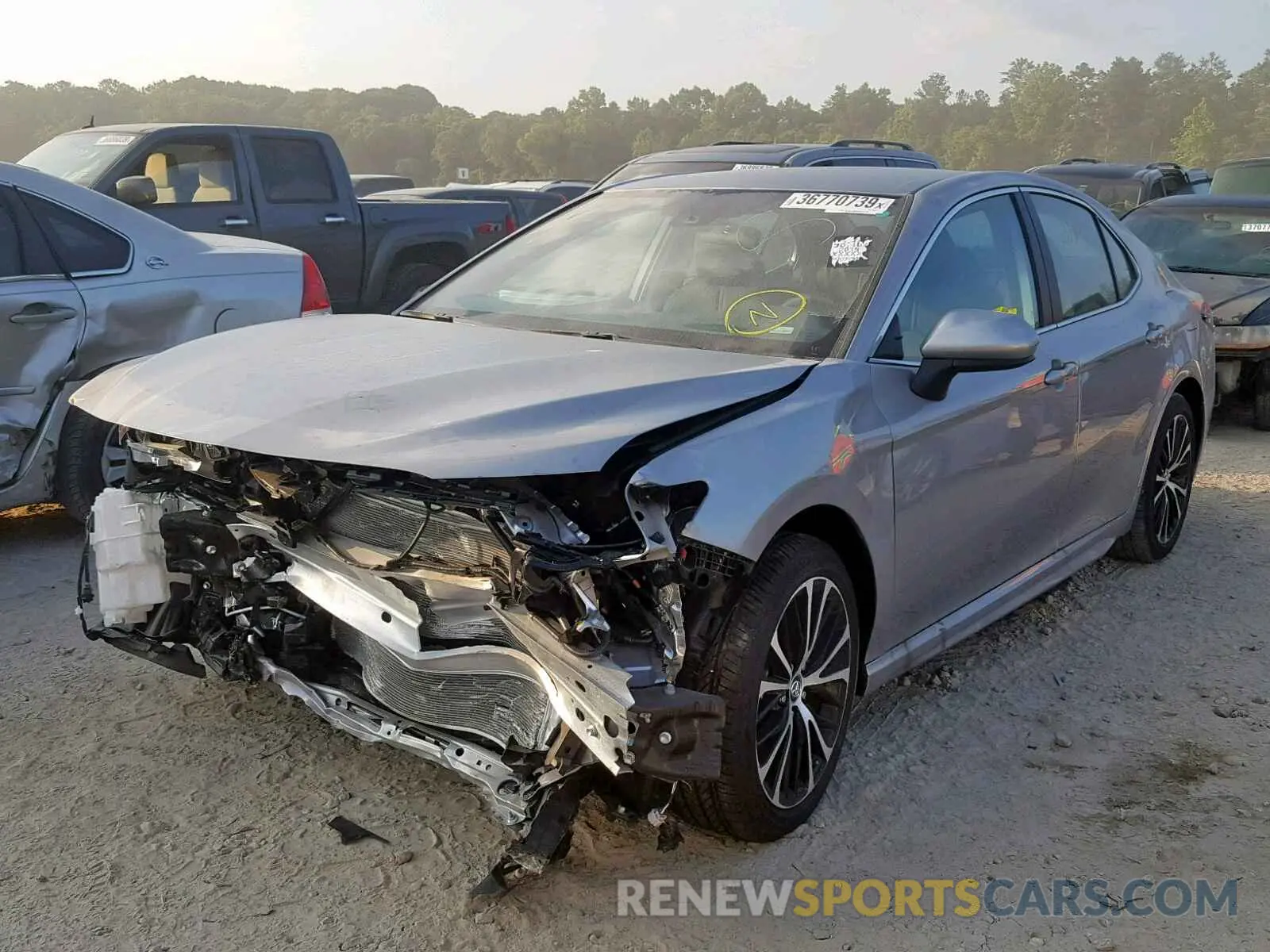 2 Photograph of a damaged car 4T1B11HK6KU218212 TOYOTA CAMRY 2019