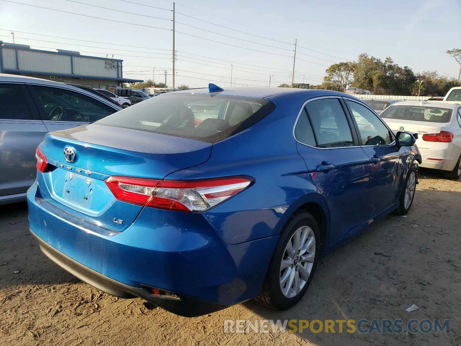 4 Photograph of a damaged car 4T1B11HK6KU230747 TOYOTA CAMRY 2019