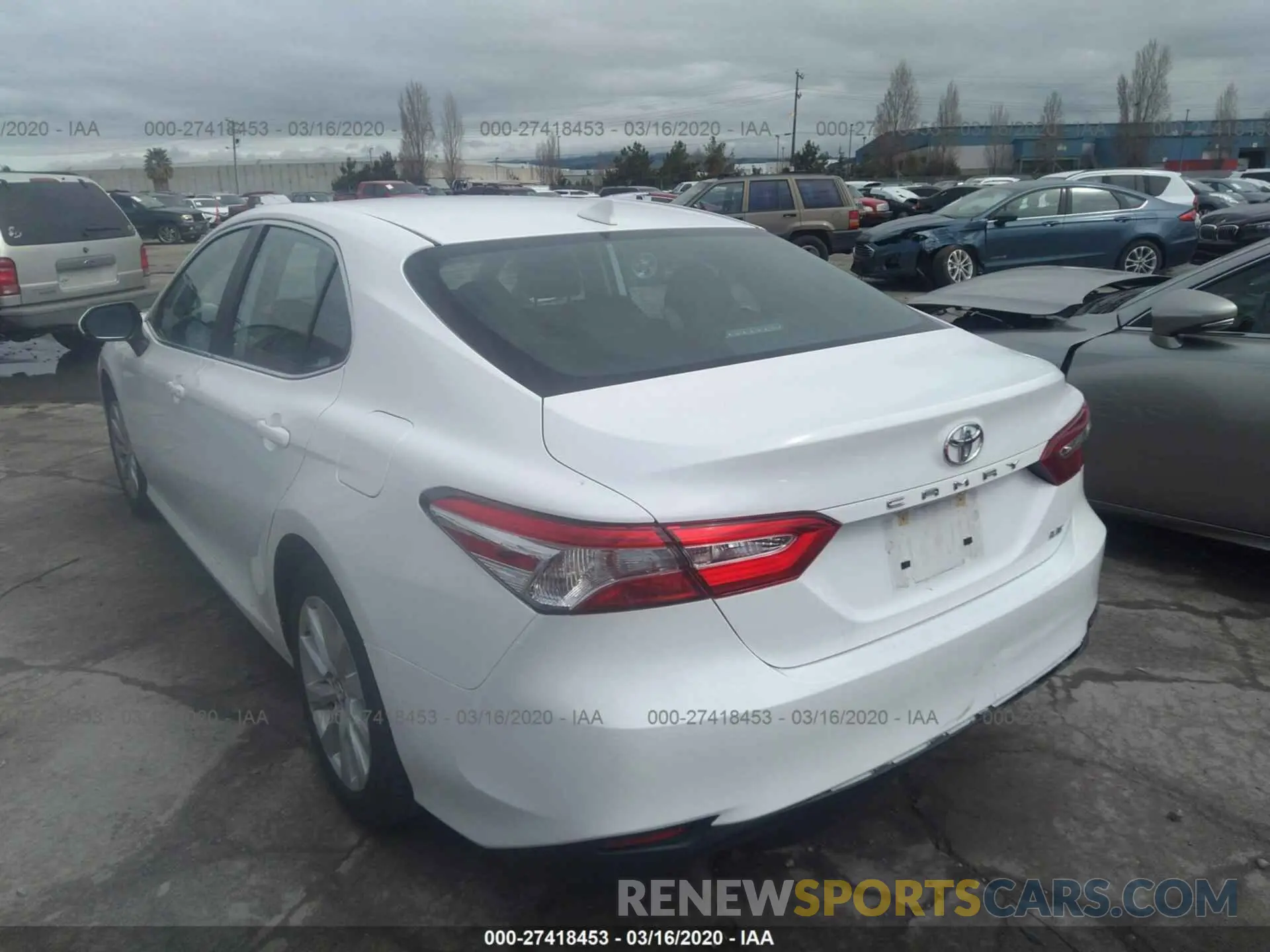 3 Photograph of a damaged car 4T1B11HK6KU242235 TOYOTA CAMRY 2019