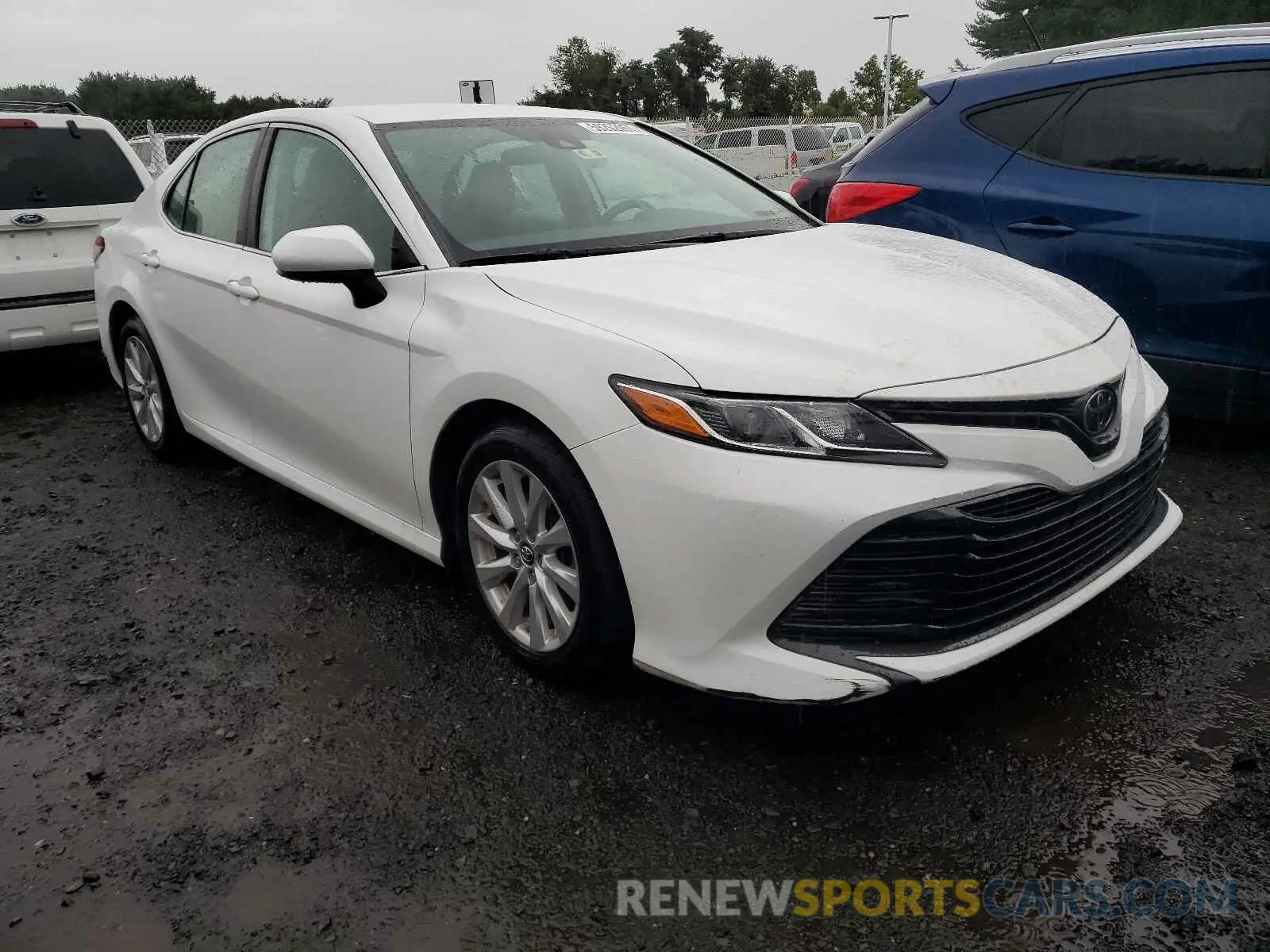 1 Photograph of a damaged car 4T1B11HK6KU242915 TOYOTA CAMRY 2019