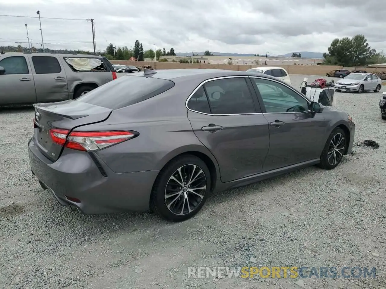 3 Photograph of a damaged car 4T1B11HK6KU702896 TOYOTA CAMRY 2019