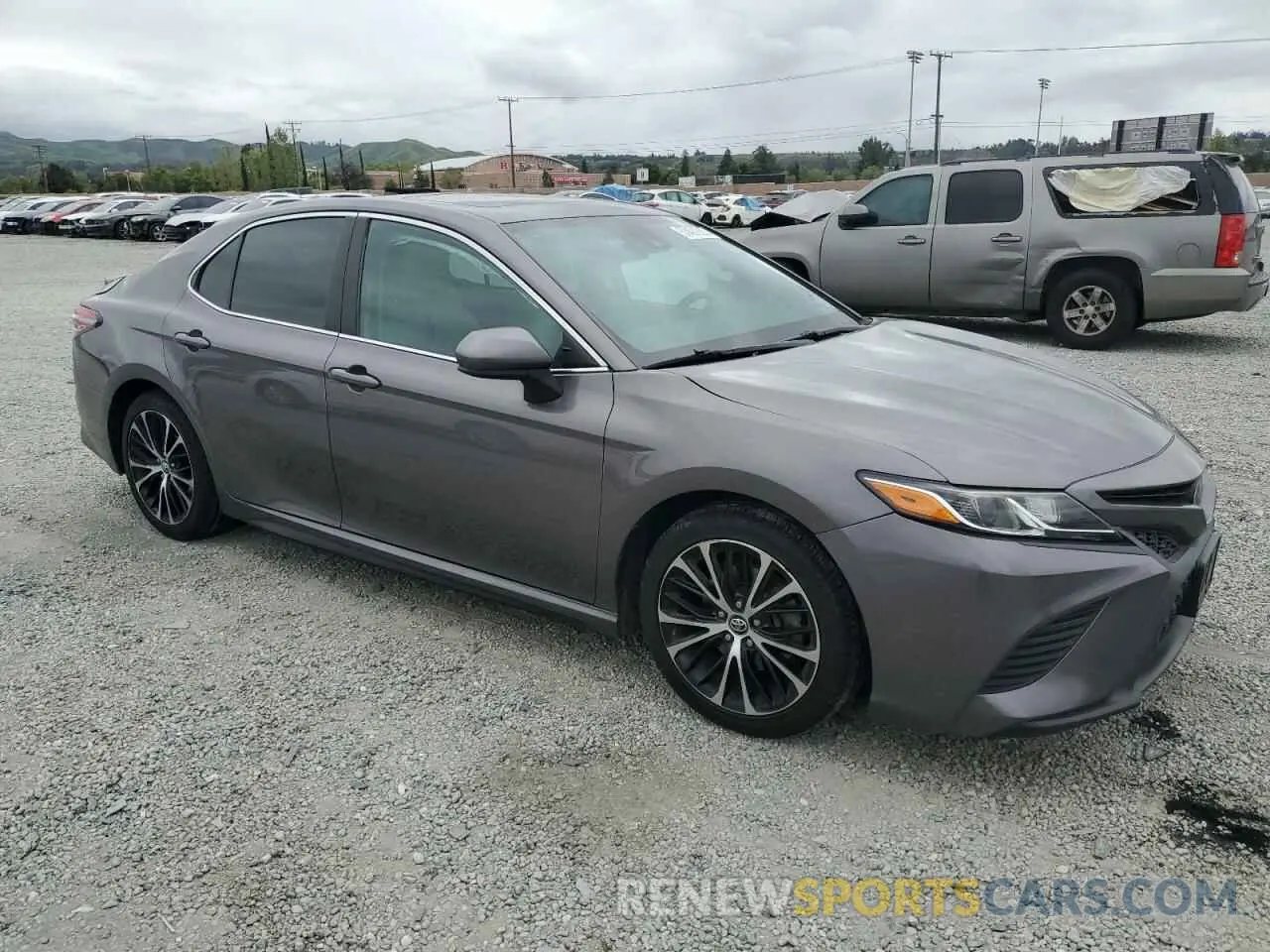 4 Photograph of a damaged car 4T1B11HK6KU702896 TOYOTA CAMRY 2019