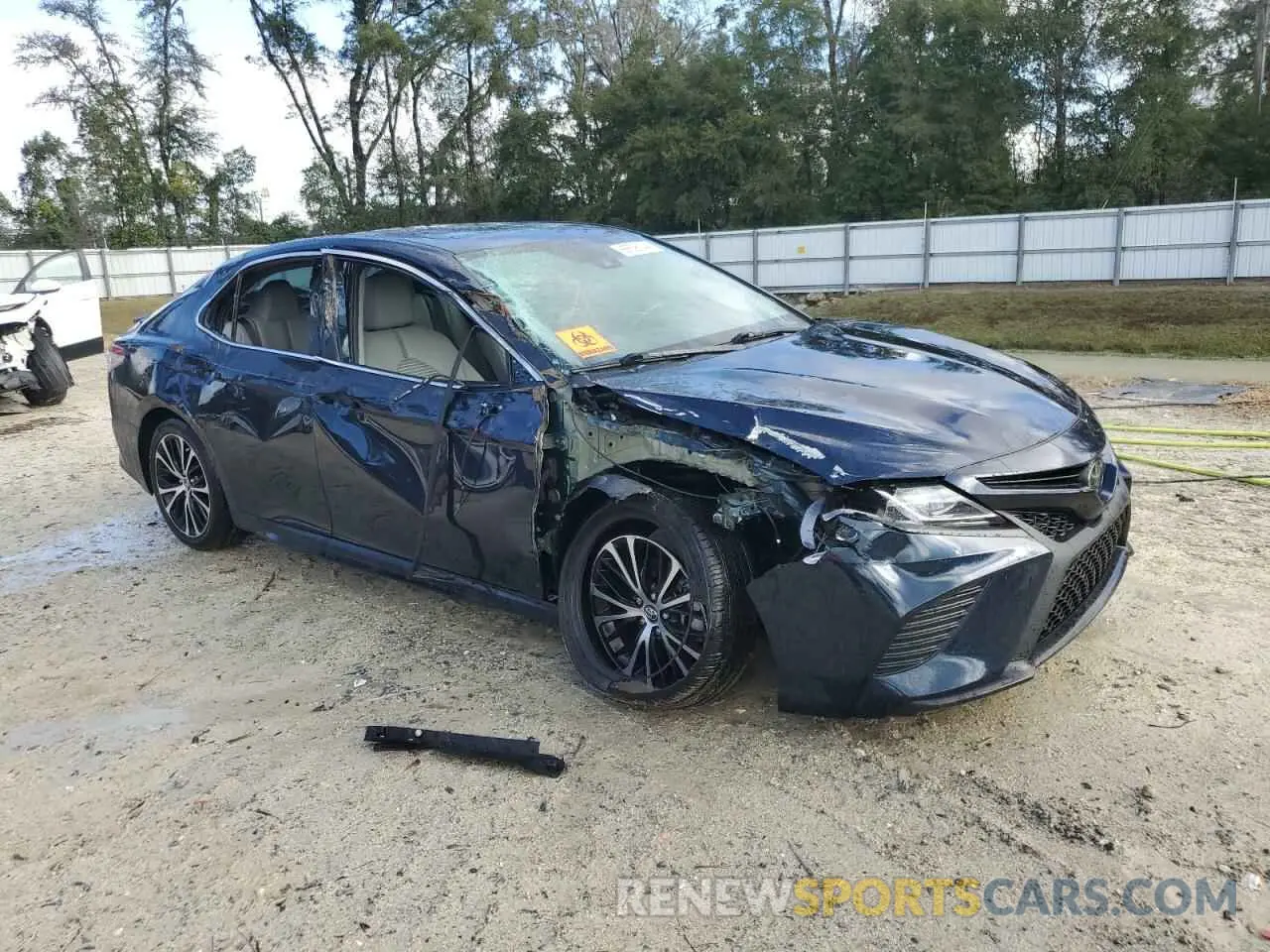 4 Photograph of a damaged car 4T1B11HK6KU709895 TOYOTA CAMRY 2019