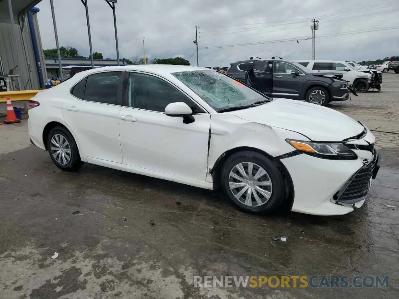 4 Photograph of a damaged car 4T1B11HK6KU717429 TOYOTA CAMRY 2019