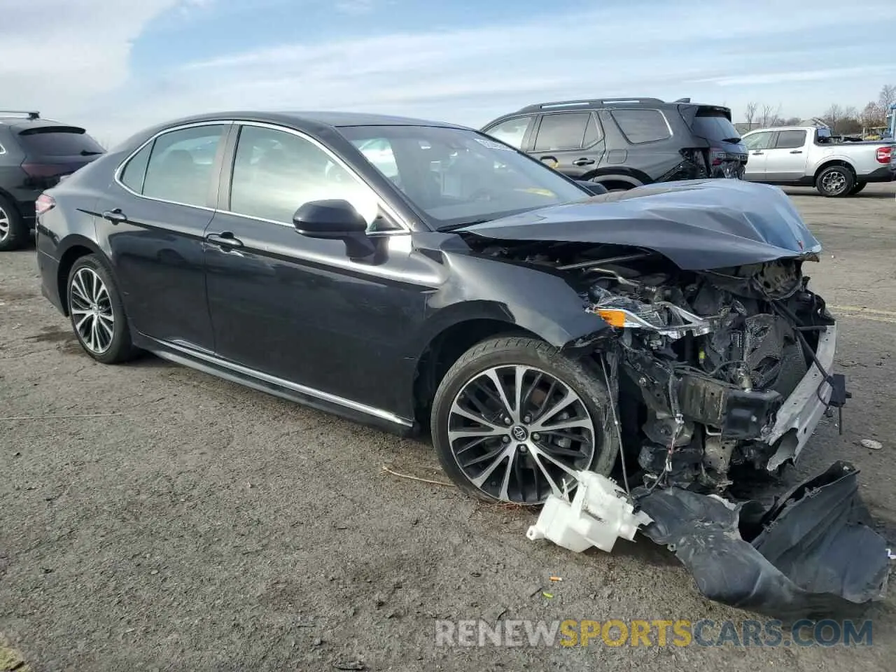 4 Photograph of a damaged car 4T1B11HK6KU780689 TOYOTA CAMRY 2019