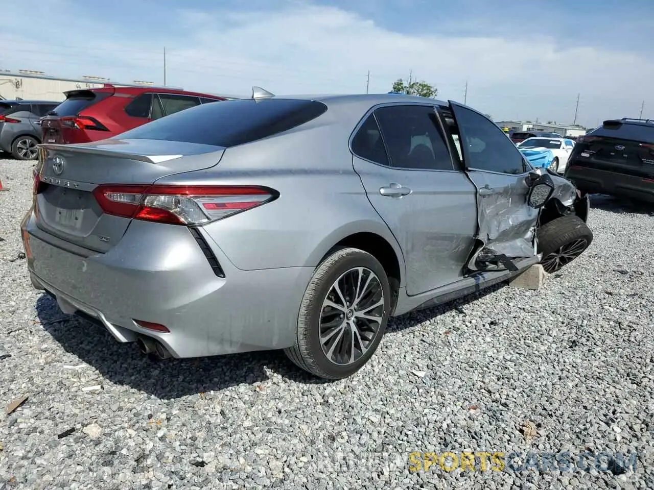 3 Photograph of a damaged car 4T1B11HK6KU856282 TOYOTA CAMRY 2019