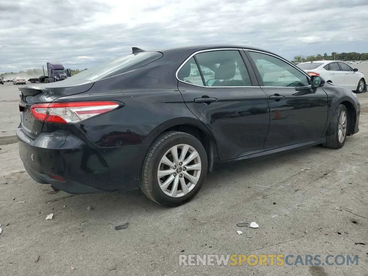 3 Photograph of a damaged car 4T1B11HK7KU172258 TOYOTA CAMRY 2019
