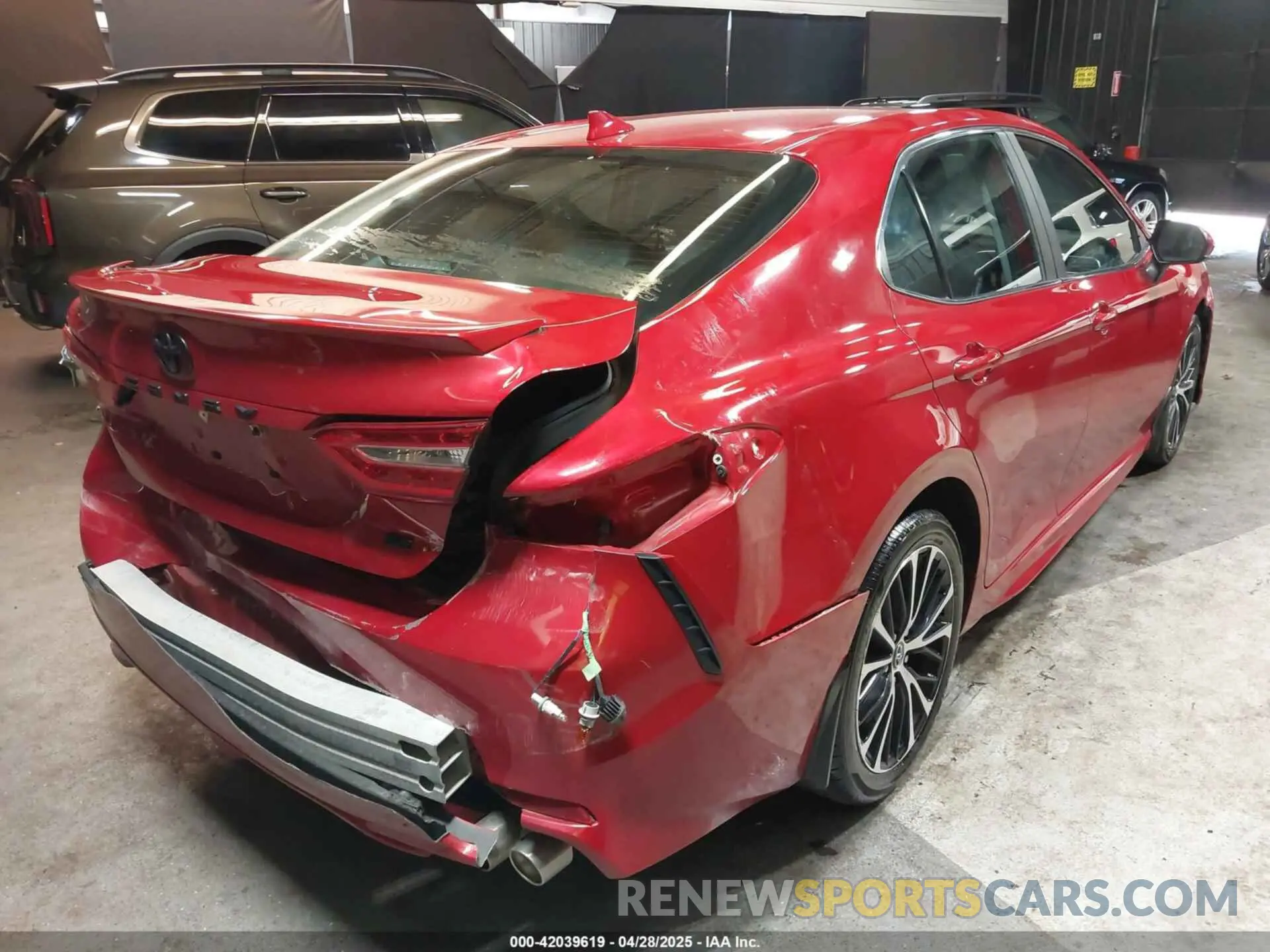 4 Photograph of a damaged car 4T1B11HK7KU271937 TOYOTA CAMRY 2019