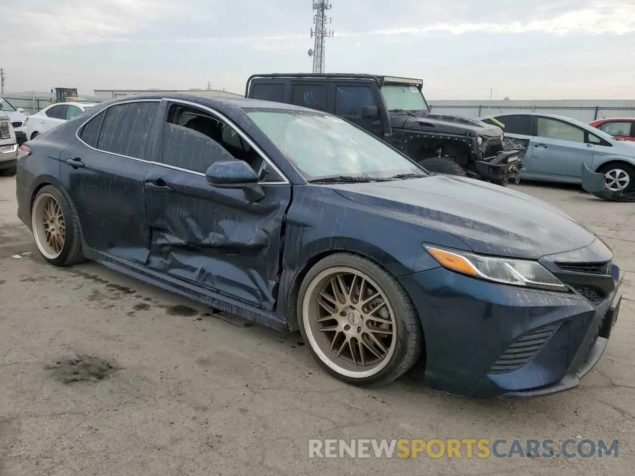 4 Photograph of a damaged car 4T1B11HK7KU682190 TOYOTA CAMRY 2019