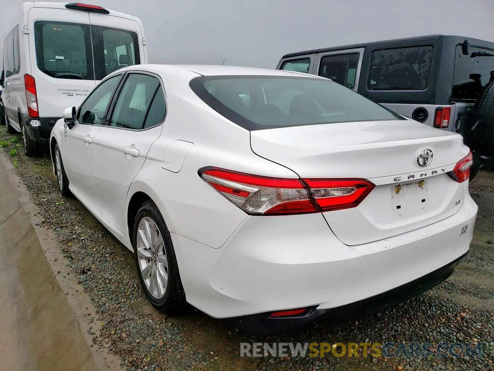 3 Photograph of a damaged car 4T1B11HK7KU694100 TOYOTA CAMRY 2019