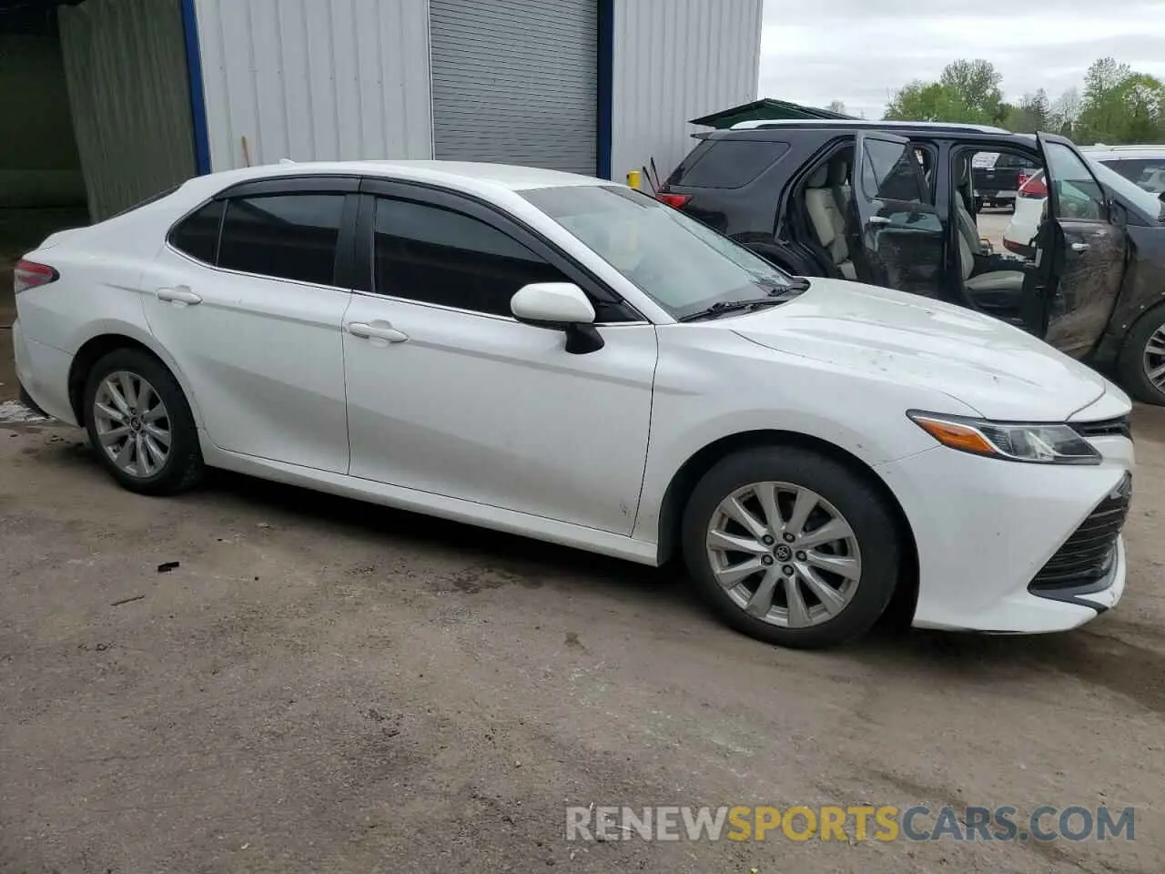 4 Photograph of a damaged car 4T1B11HK7KU698017 TOYOTA CAMRY 2019