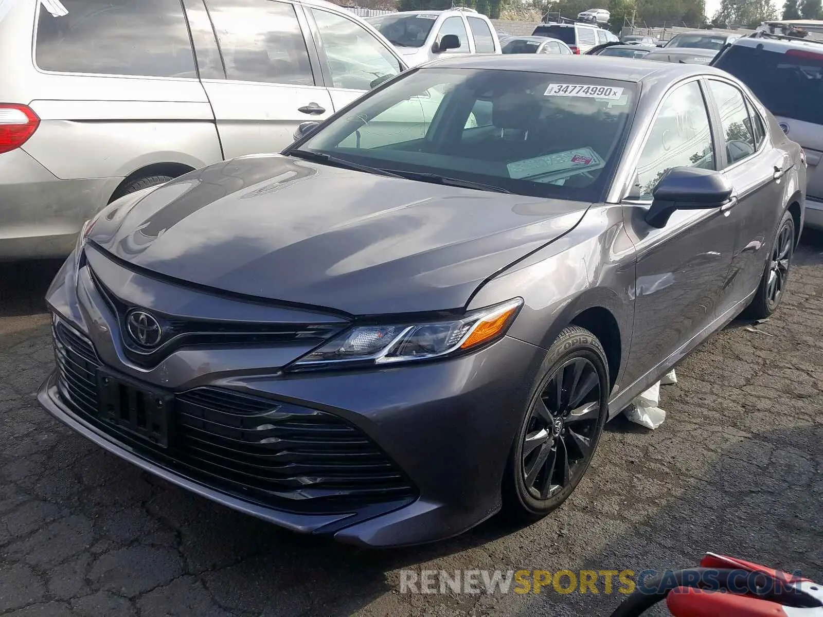 2 Photograph of a damaged car 4T1B11HK7KU698437 TOYOTA CAMRY 2019