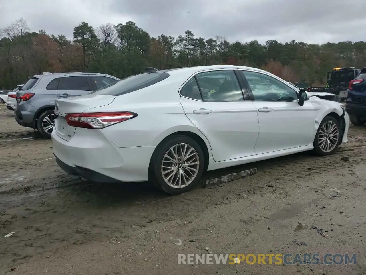 3 Photograph of a damaged car 4T1B11HK7KU700459 TOYOTA CAMRY 2019