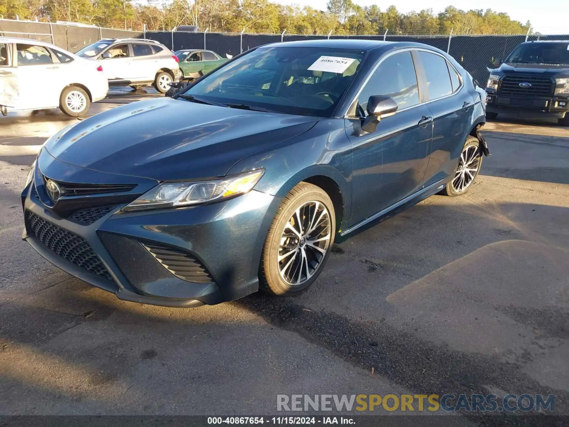 2 Photograph of a damaged car 4T1B11HK7KU702857 TOYOTA CAMRY 2019