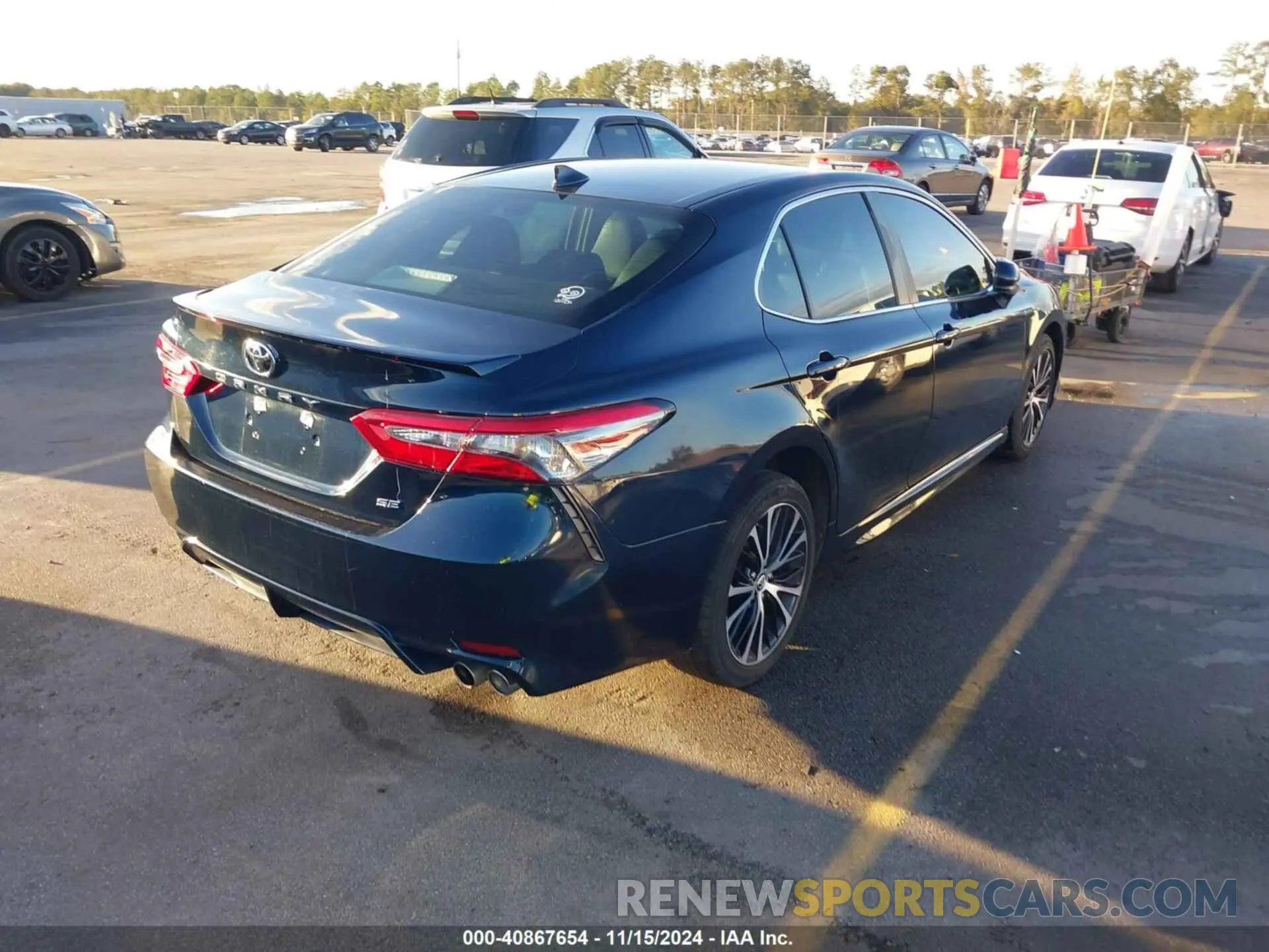4 Photograph of a damaged car 4T1B11HK7KU702857 TOYOTA CAMRY 2019