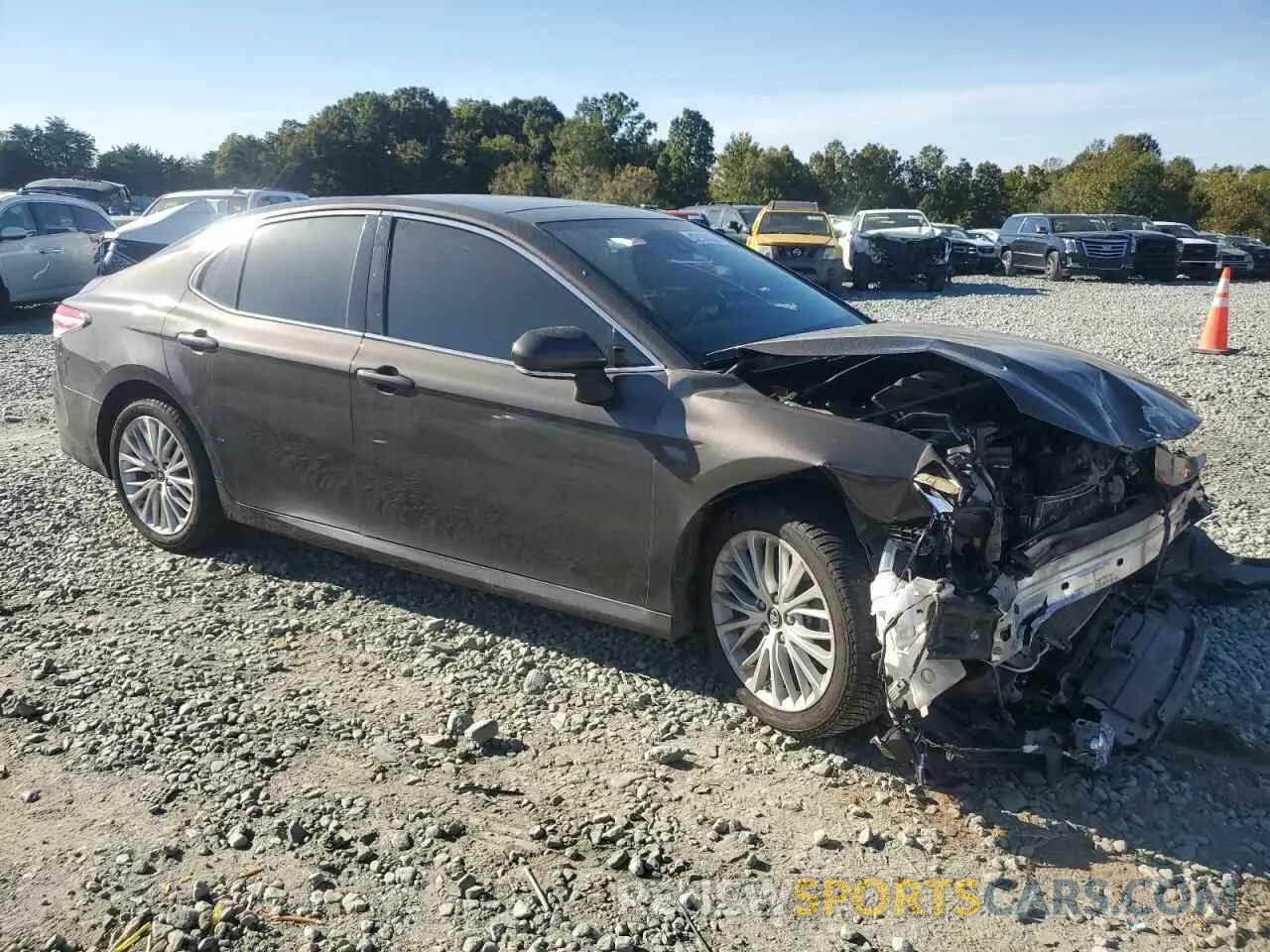 4 Photograph of a damaged car 4T1B11HK7KU715222 TOYOTA CAMRY 2019