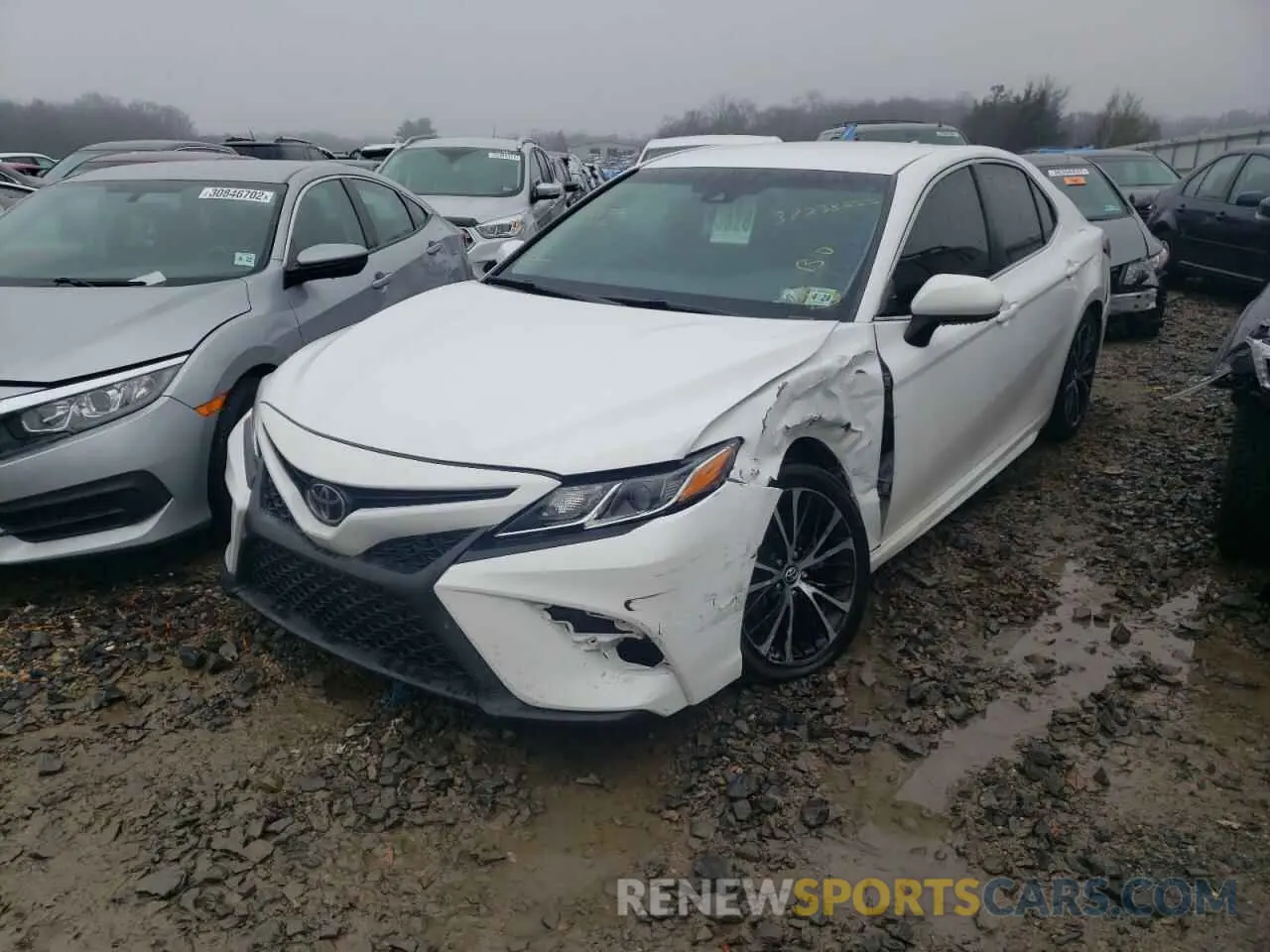2 Photograph of a damaged car 4T1B11HK7KU734000 TOYOTA CAMRY 2019