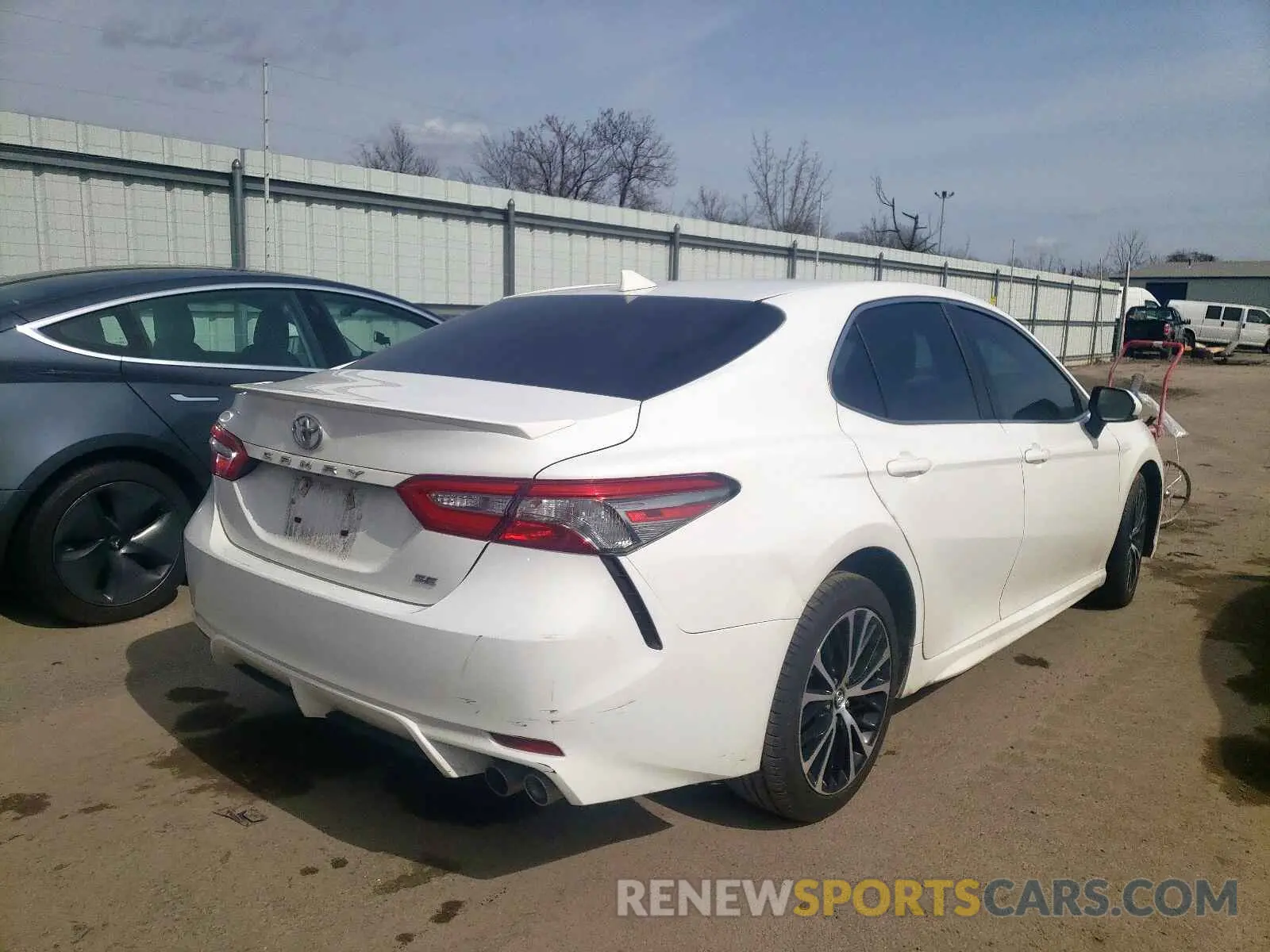4 Photograph of a damaged car 4T1B11HK7KU734000 TOYOTA CAMRY 2019