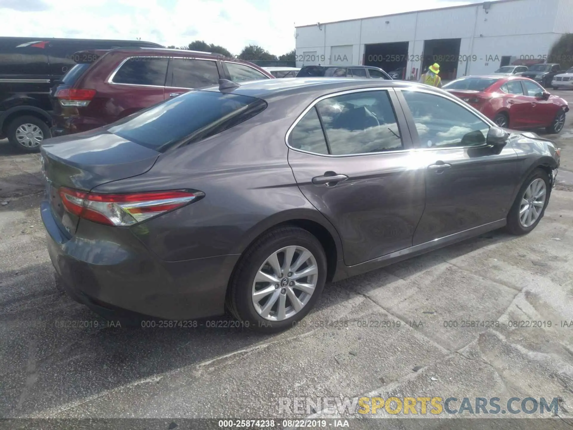 4 Photograph of a damaged car 4T1B11HK7KU743280 TOYOTA CAMRY 2019
