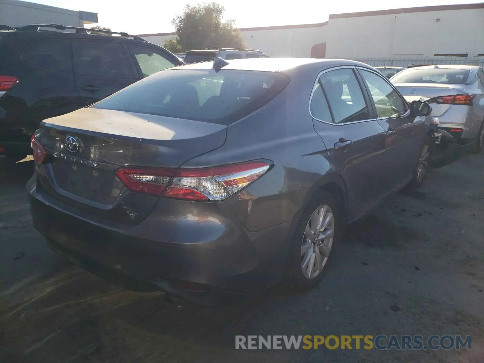 4 Photograph of a damaged car 4T1B11HK7KU771595 TOYOTA CAMRY 2019