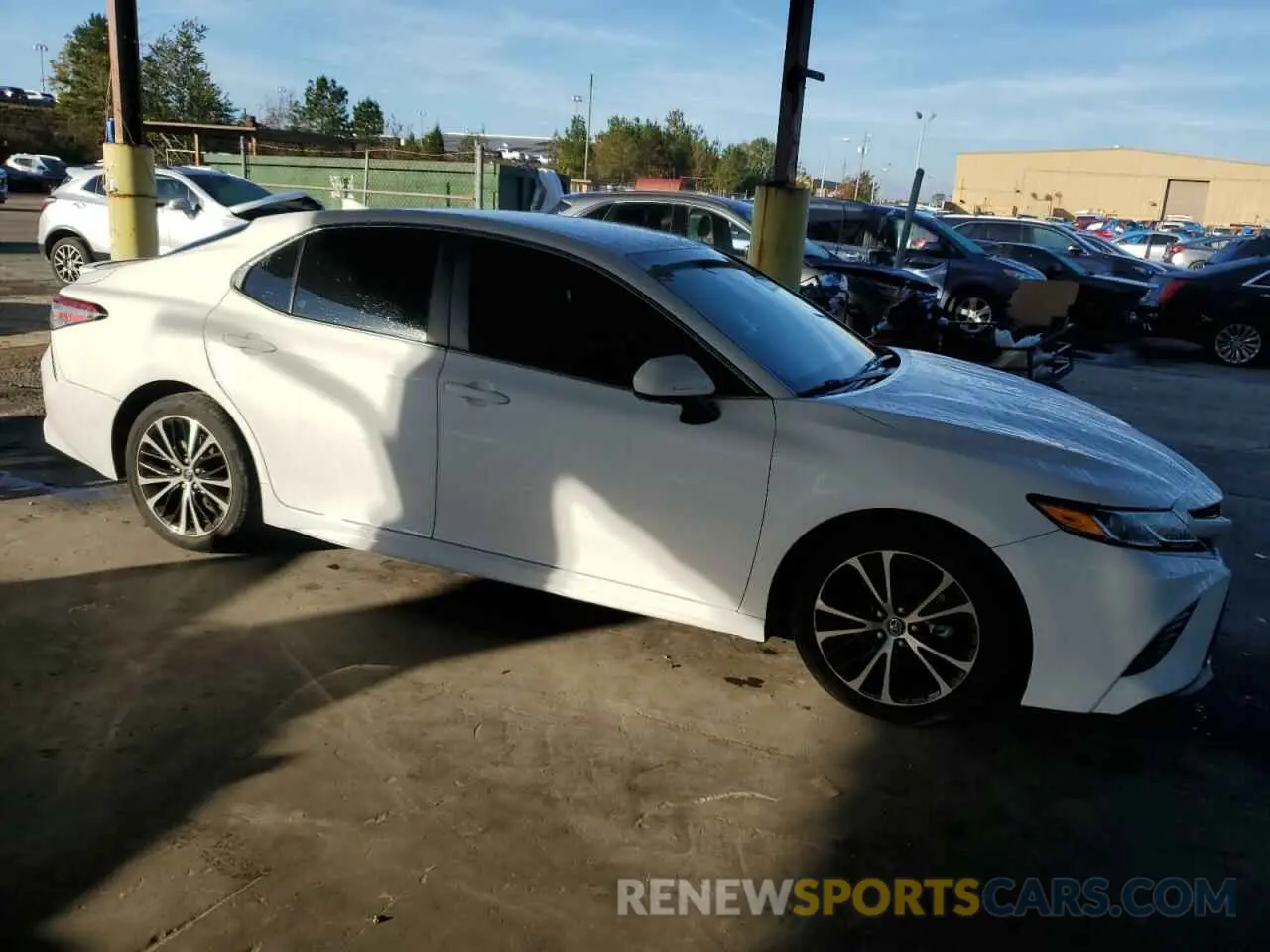 4 Photograph of a damaged car 4T1B11HK8KU184452 TOYOTA CAMRY 2019