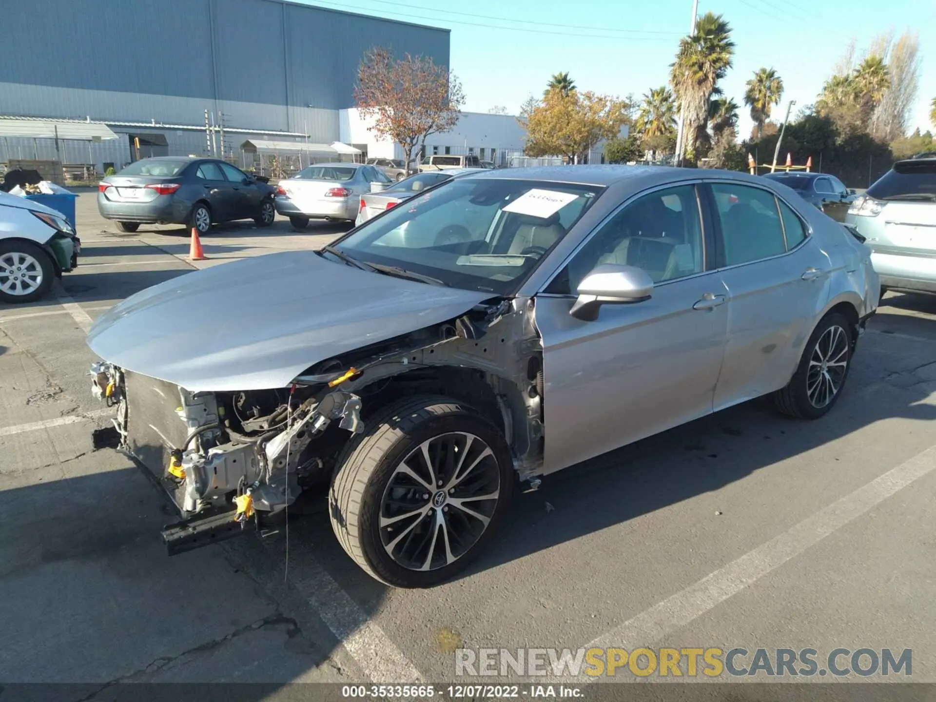 2 Photograph of a damaged car 4T1B11HK8KU743093 TOYOTA CAMRY 2019